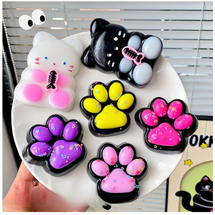 Set 12 Jucarii Antistres Squishy, Revenire Lenta, Model Labuta de Pisica, Material Moale, 4 Culori, 6.8x6.2 cm, 55g, 12 Bucati