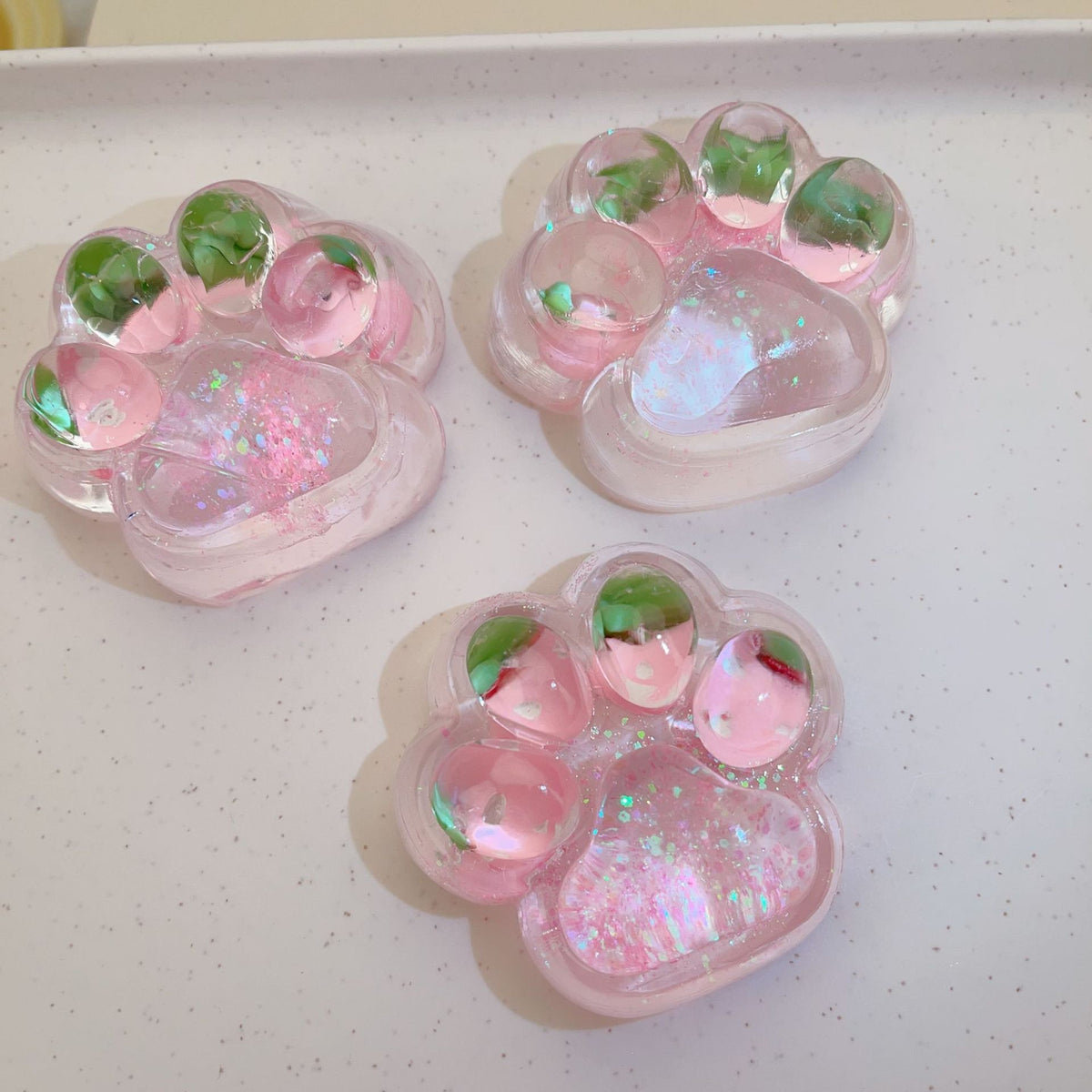 Jucarie Antistres Squishy, Model Labuta de Pisica cu Sclipici, Revenire Lenta, Silicon Moale, 6.5x6 cm, 60g, Roz