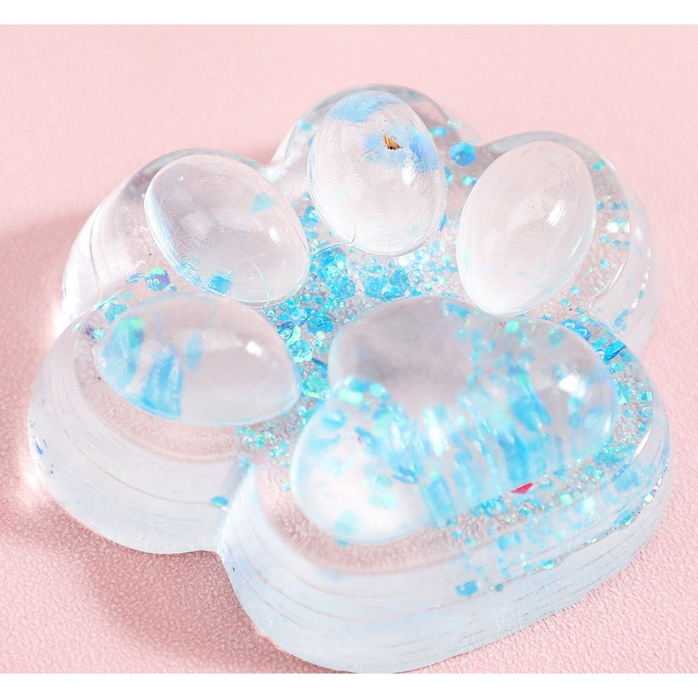 Jucarie Antistres Squishy Laba de Pisica, Revenire Lenta, Model Cat Paw cu Sclipici, Material TPR Moale, 6.5 x 7 cm, Transparent cu Inseritii, 62 g