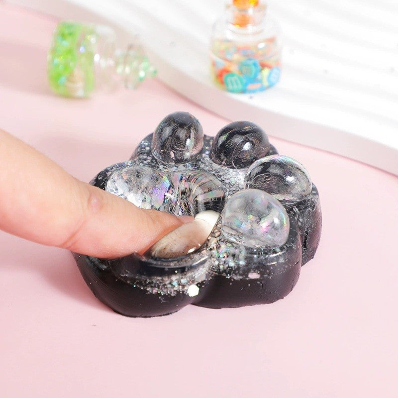 Jucarie Antistres Squishy, Model Labuta de Pisica Cat Paw, Revenire Lenta, Material TPR Flexibil, 6.5 x 6 cm, Negru cu Insertii, 1 Bucata