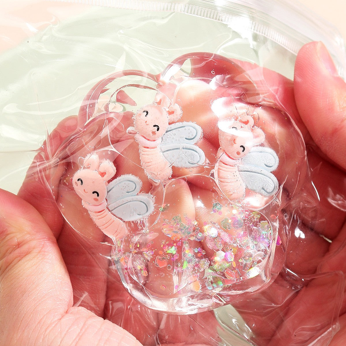 Jucarie Antistres Squishy, Labuta de Pisica cu Revenire Lenta, Model Transparent cu Inserții, Material TPR Moale, 6.5 x 7 cm, 62 g