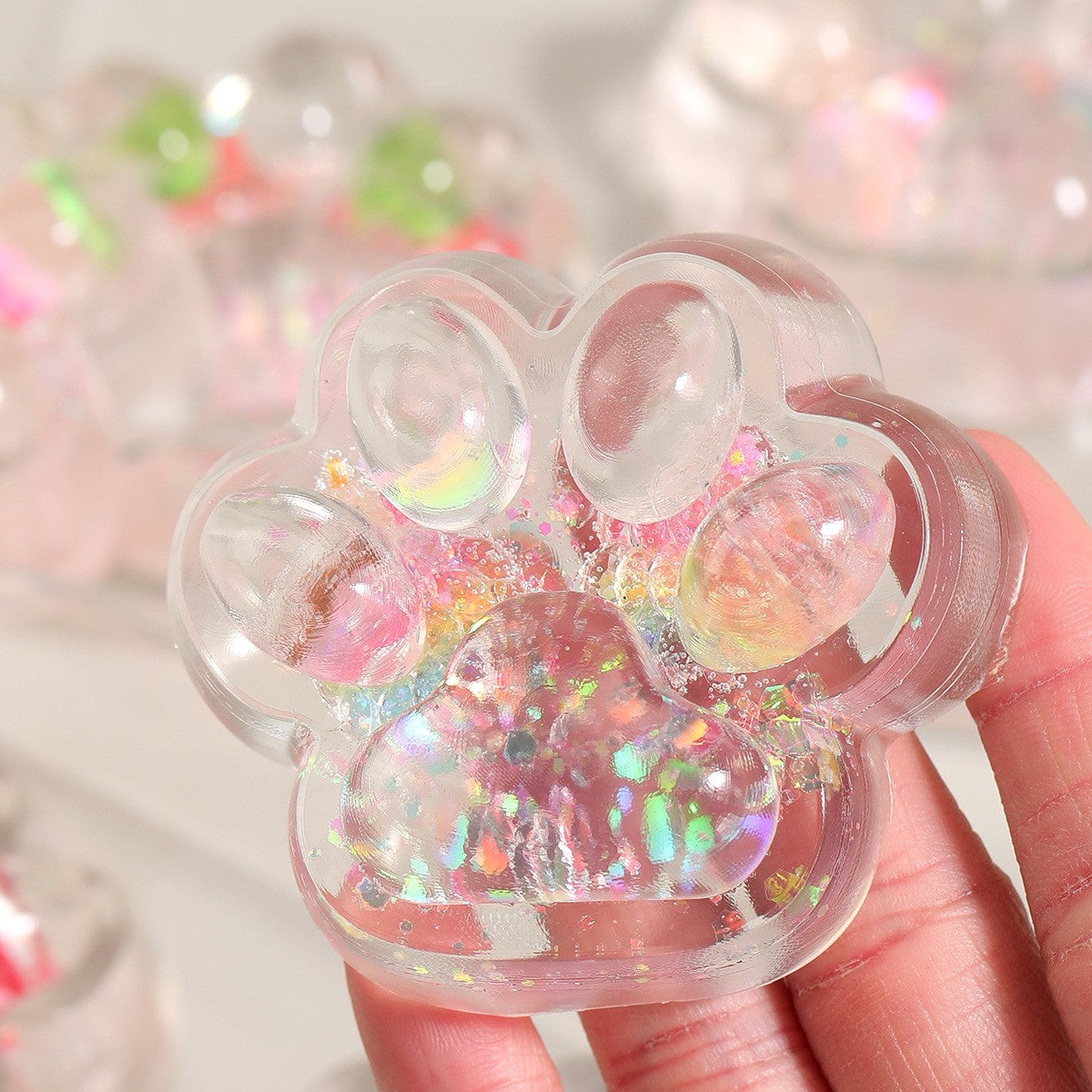 Jucarie Antistres Squishy, Labuta de Pisica Pufoasa cu Revenire Lenta, Material TPR Flexibil, Stimulare Senzoriala, 7 x 6.5 cm, Multicolor