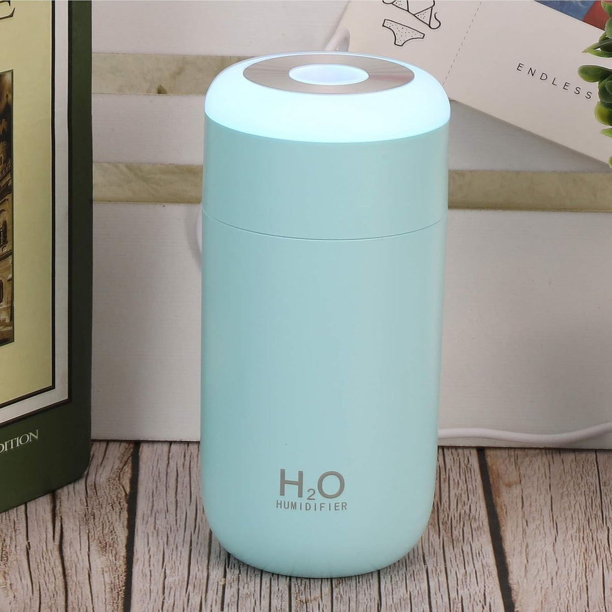 Umidificator Portabil H2O, Difuzor Aroma si Purificator Aer, Silentios 30dB, 2 Moduri Pulverizare, Lumina Noapte LED 7 Culori, Alimentare USB, Plastic, 350ml, Albastru