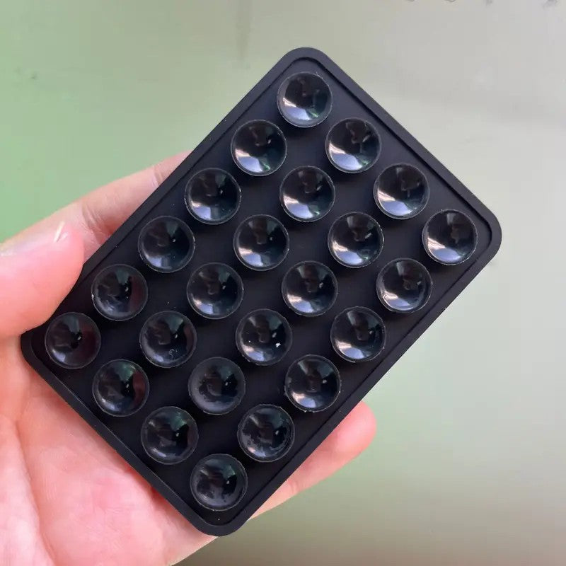 Suport Adeziv Universal pentru Telefon si Tableta, cu 24 Ventuze pentru Selfie si TikTok, Silicon Ecologic, 8 x 5.5 x 1 cm, Negru