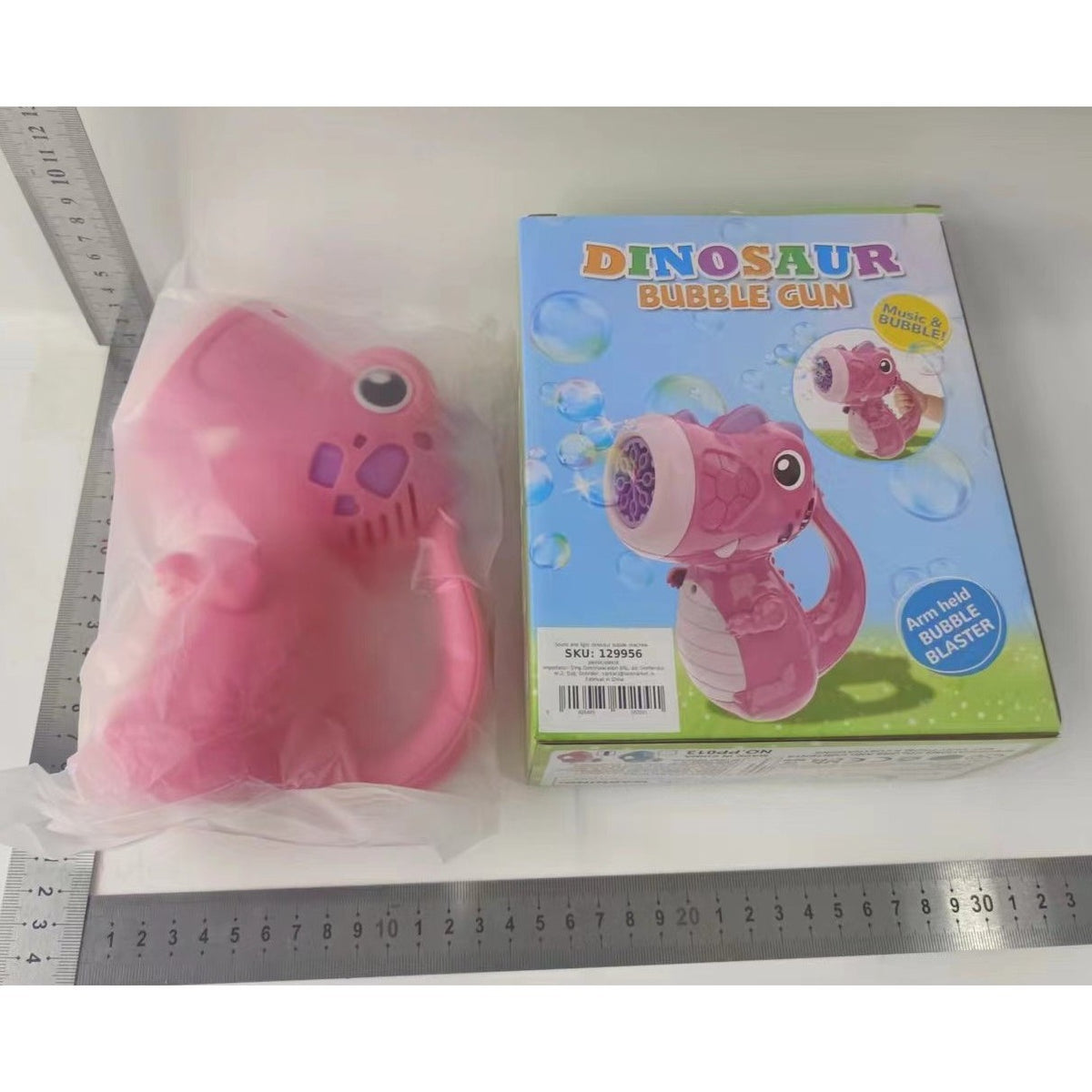 Pistol Automat Baloane de Sapun, Jucarie Interactiva Dinozaur cu 8 Orificii, Sunete si Lumini, Rotire 360 Grade, Plastic, 15 x 8.5 x 18.5 cm, Roz