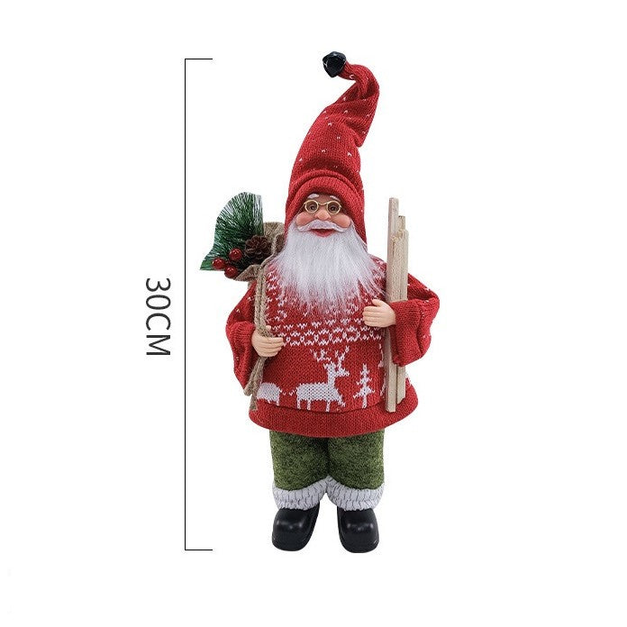 Figurina Decorativa Mos Craciun cu Lemne si Flori, Ornament Festiv pentru Interior si Exterior, Plastic si Textil Catifelat, 30 x 17 x 10 cm, Rosu/Verde
