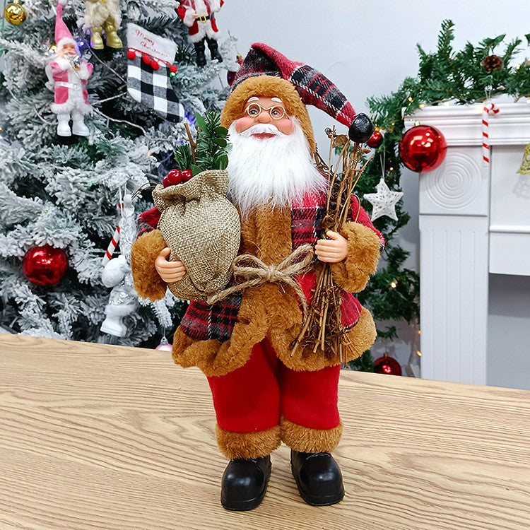 Figurina Decorativa Mos Craciun Asezat, Decoratiune Craciun cu Surcele, Interior si Exterior, Plastic si Textil, 35 x 18 x 20 cm, Rosu si Maro