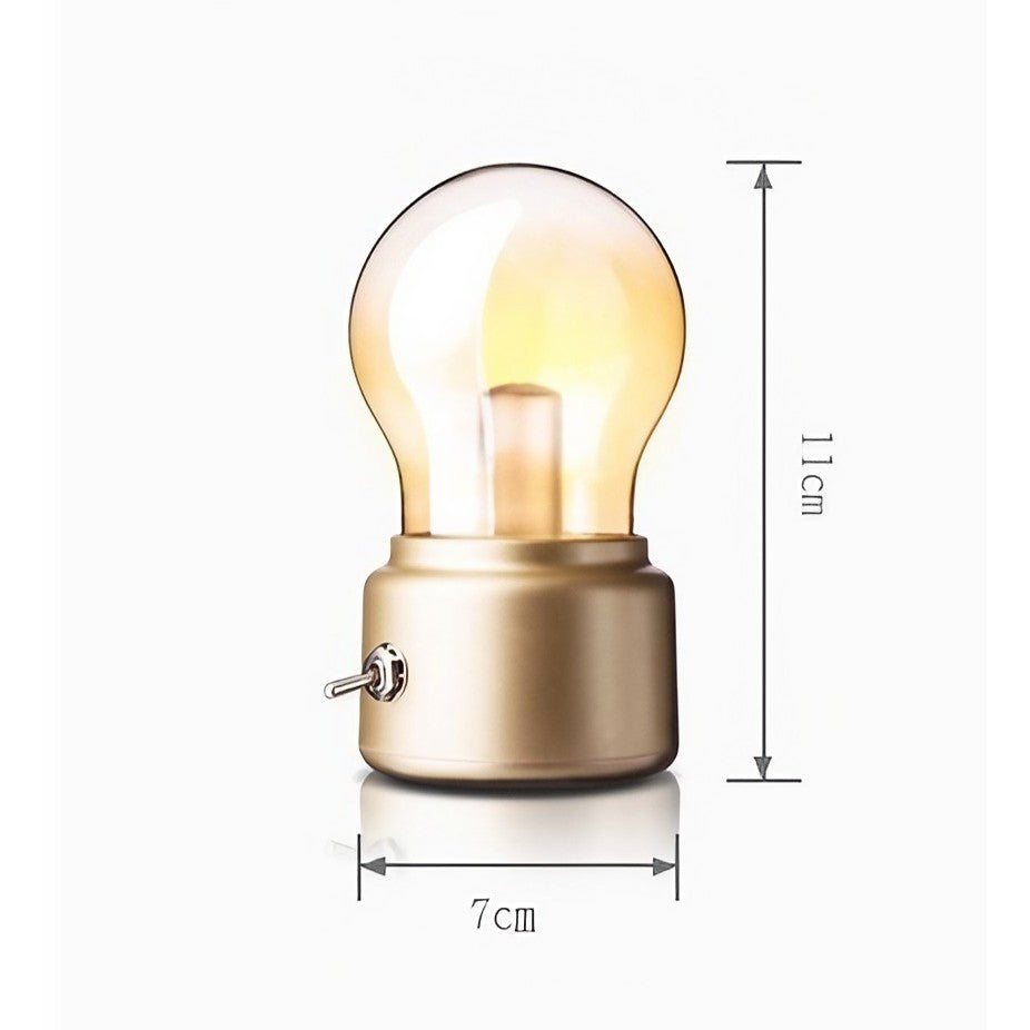 Lampa LED Decorativa Retro Sub Forma De Bulb, Lumina Calda, Comutator Metalic, Incarcare USB, Autonomie 12 Ore, Sticla si ABS, Bej Transparent, 11x7x6 cm