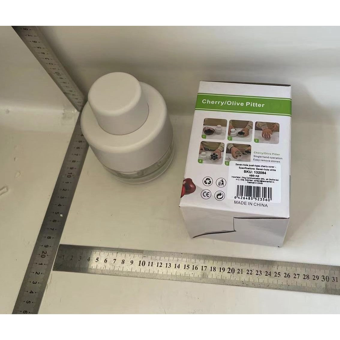 Dispozitiv Manual de Scos Samburi pentru Cirese si Masline, Capacitate 7 Gauri, Plastic ABS si AS, 13 x 9.2 cm, Alb