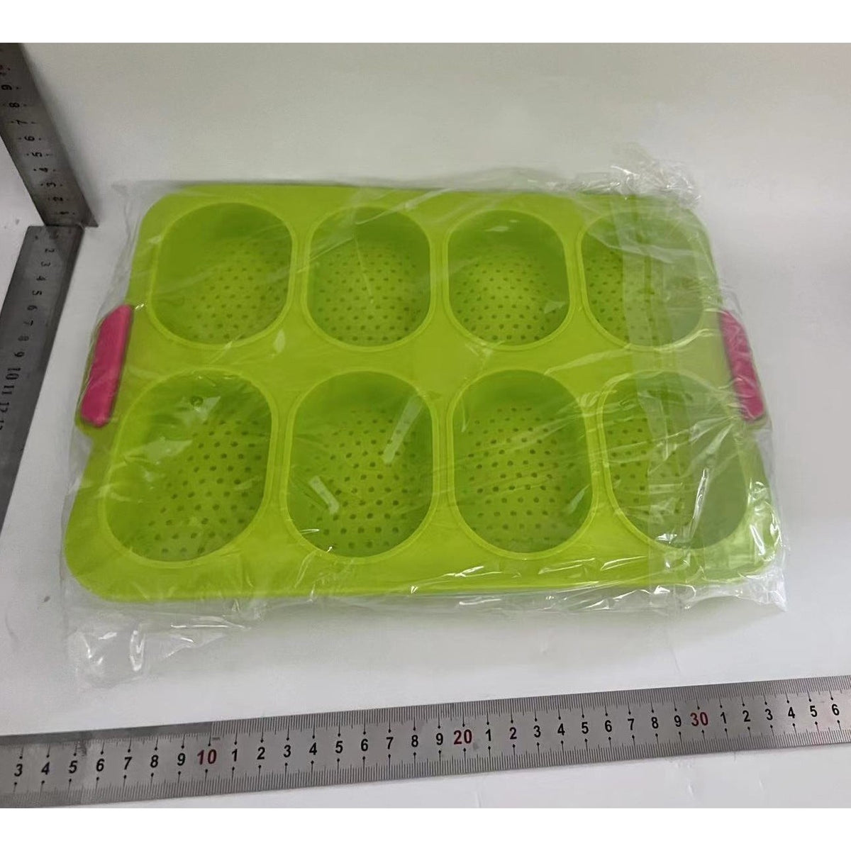 Forme de Silicon pentru Copt, Tava cu 8 Cavitati Ovale pentru Paine si Prajituri, Material Antiaderent Termorezistent, 34.5 x 23.8 x 2.5 cm, Verde/Roz