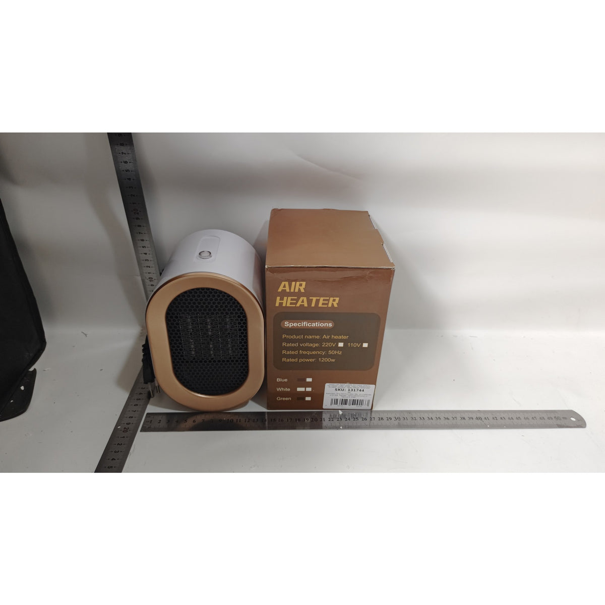 Mini Aeroterma Portabila, Incalzitor Electric cu Element PTC, Putere 1200 W, Termostat Reglabil, Design Compact, Alb, 12.5 x 12.5 x 19.5 cm, 800 g
