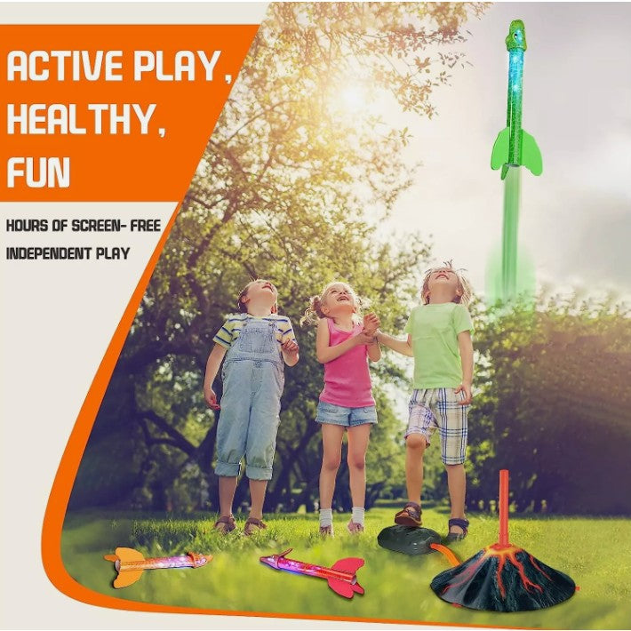 Lansator de Rachete cu Piciorul pentru Copii, Model Vulcan cu 3 Rachete Dinozaur cu Lumini LED, Jucarie de Exterior din Spuma si Plastic, 30 cm, Multicolor