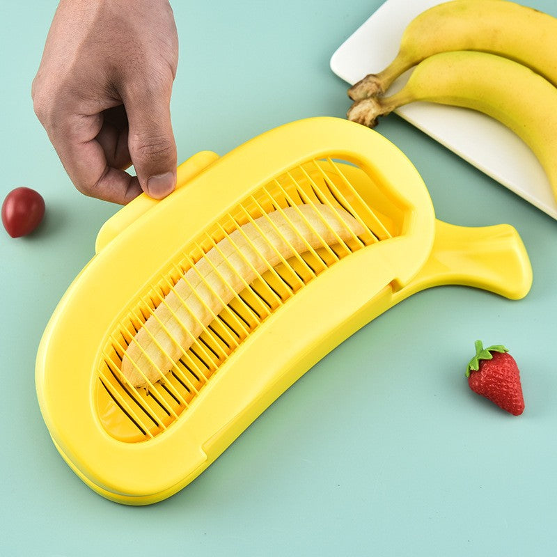 Feliator Multifunctional pentru Legume si Fructe, Design Model Banana, Lame Otel Inoxidabil, Accesorii Bucatarie, 28.8x18.3 cm, Galben