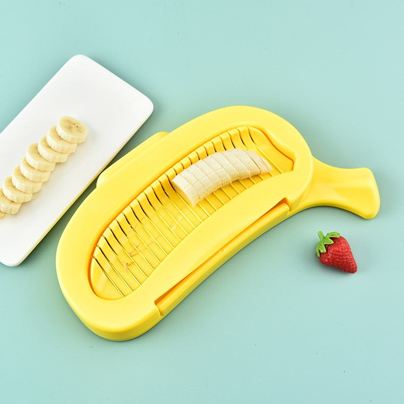 Feliator Multifunctional pentru Legume si Fructe, Design Model Banana, Lame Otel Inoxidabil, Accesorii Bucatarie, 28.8x18.3 cm, Galben
