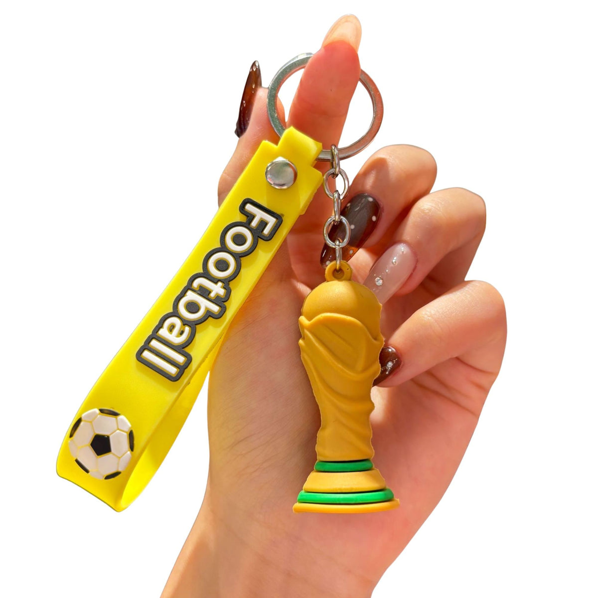 Breloc Chei Fotbal, Model Trofeu Mascota Cupa Mondiala, Accesoriu pentru Rucsac si Ghiozdan, Cauciuc Moale Flexibil, 6.2 x 3.4 cm, Galben