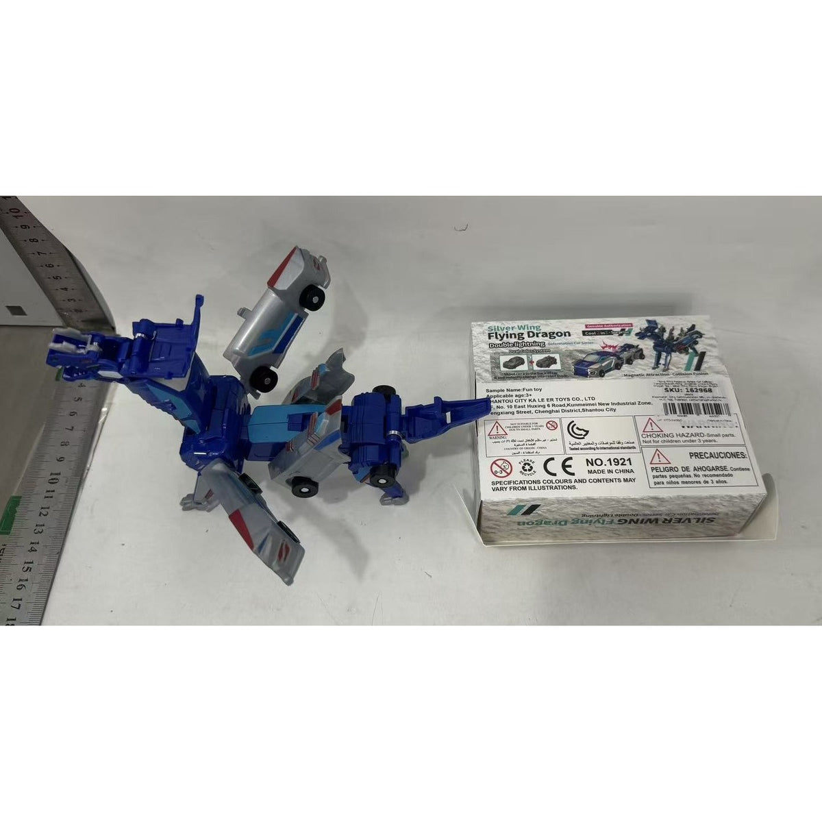 Jucarie Transformabila 2in1 Silver Wing Flying Dragon, Masina care se Transforma in Dragon prin Impact, Atractie Magnetica, Plastic ABS, +6 Ani, Albastru