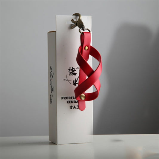 Husa pentru Kendama, Suport Depozitare si Transport cu Catarama de Agatare Tip Breloc, Piele Ecologica, 12 x 6 cm, Rosu