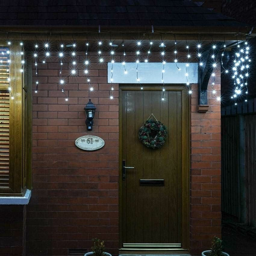 Instalatie Craciun Solara Tip Turturi, Perdea Franjurata Exterior, 143 LED-uri, 8 Jocuri de Lumini, IP44, Fir Alb, Acumulator 2400 mAh, 5m + 5m Prelungitor, Alb Rece