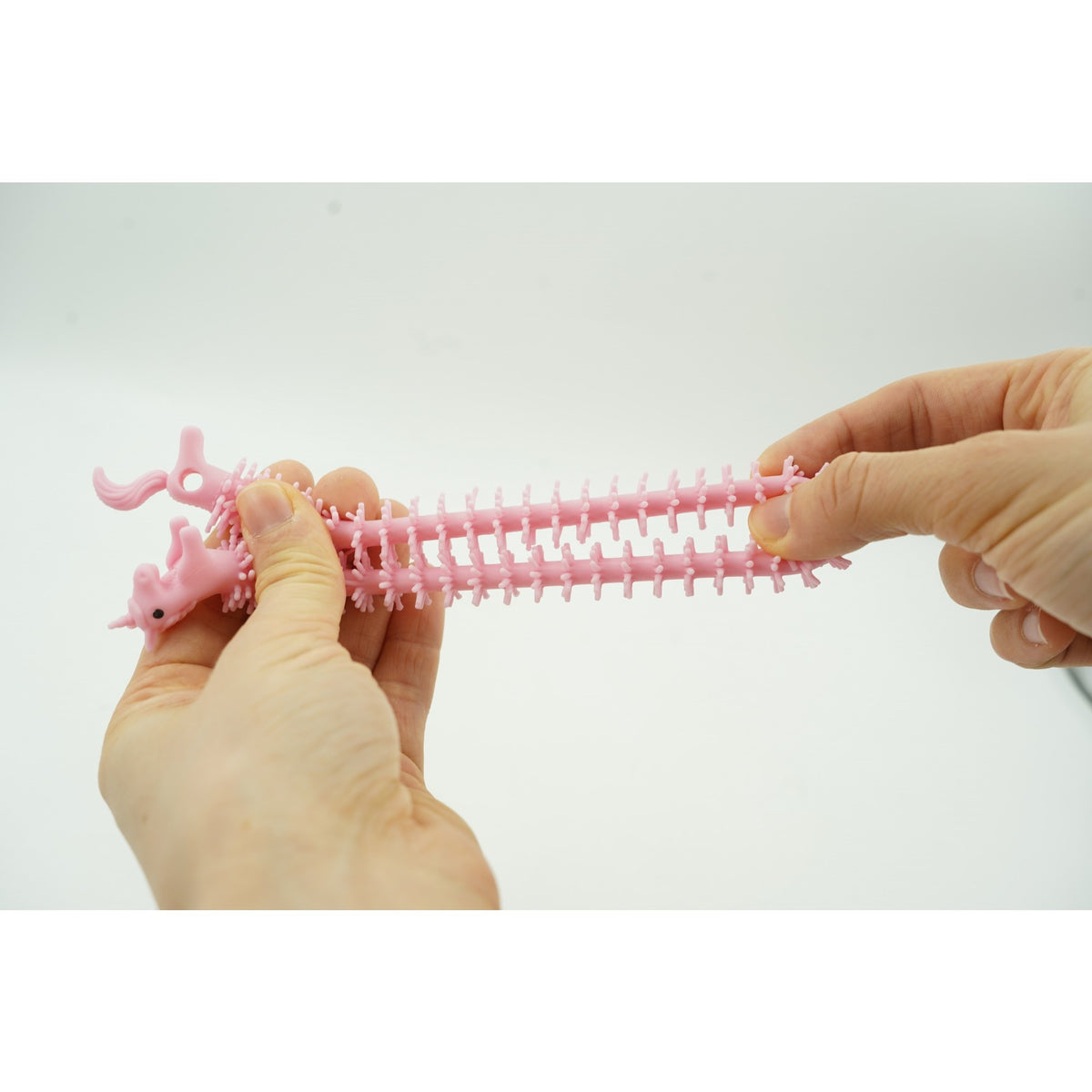 Jucarie Senzoriala Antistres, Fidget Toy Unicorn Noodles, Superelastica, Roz Deschis